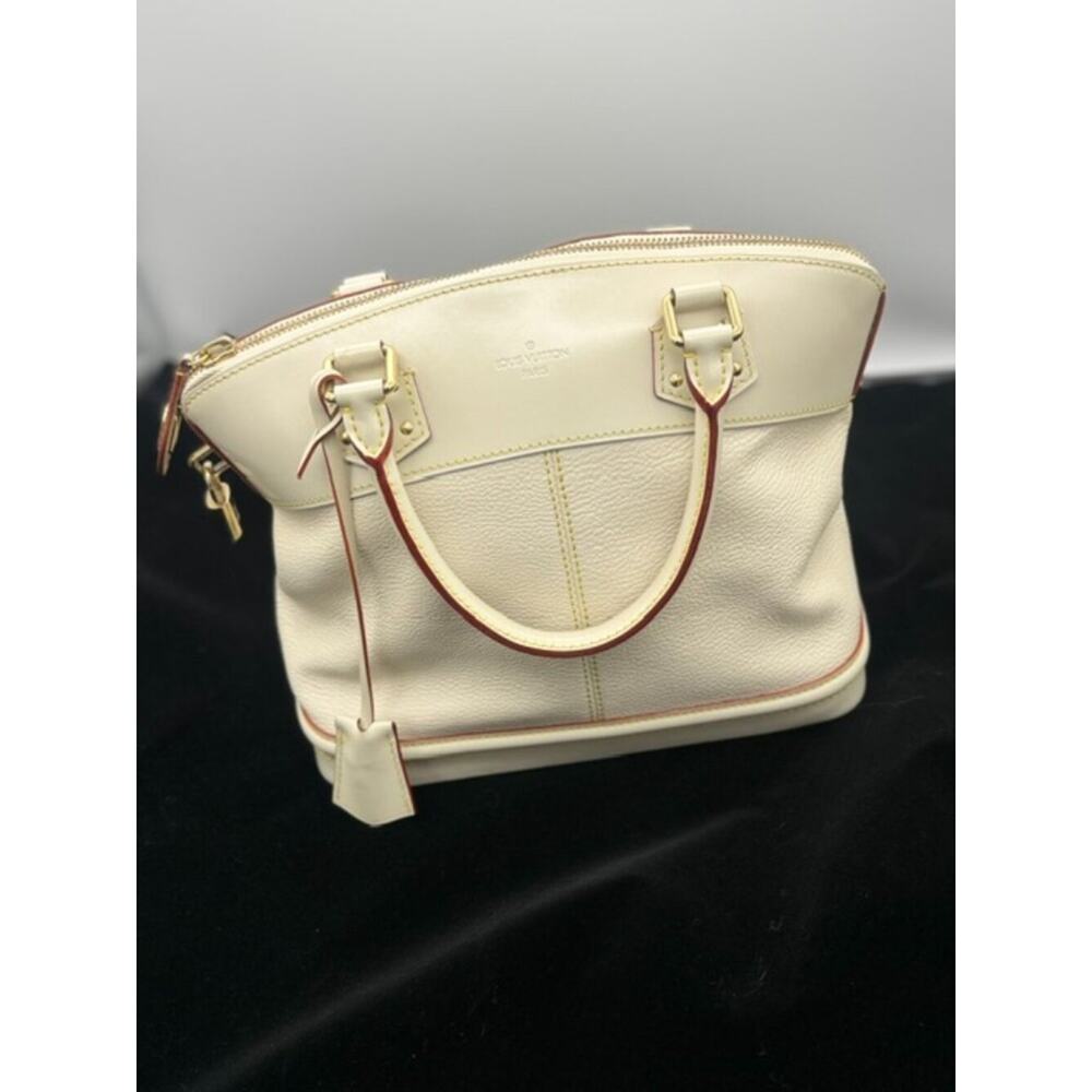 Louis Vuitton | Lockit PM | Suhali Leather | Blanc | VINTAGE - Quiet Luxury - Picture 2 of 16